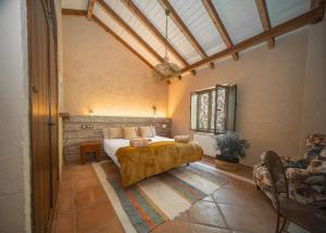 Posteľ alebo postele v izbe v ubytovaní Eco Hotel Cueva del Gato