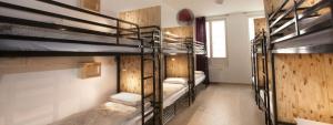 Postel nebo postele na pokoji v ubytování Le Flâneur Guesthouse