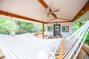 a hammock in a house with a porch at Bluebonnet Trail in Waco