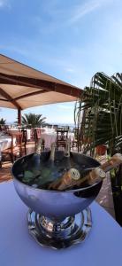 a bowl sitting on top of a table at Agriturismo Villa Bardi struttura con camere vista mare in Riva Trigoso