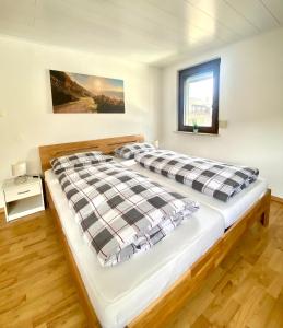 Postel nebo postele na pokoji v ubytování Ferienwohnung Sonnen - Terrasse