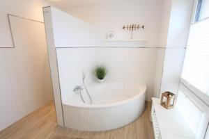 Koupelna v ubytování Nordsee Park Strandhuus,11b + 33 fotografií