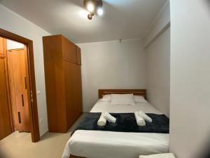 Ένα ή περισσότερα κρεβάτια σε δωμάτιο στο Penny's luxury city apartment