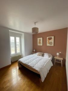 Posteľ alebo postele v izbe v ubytovaní Charmant appartement avec terrasse entre centre-ville et plages de Concarneau