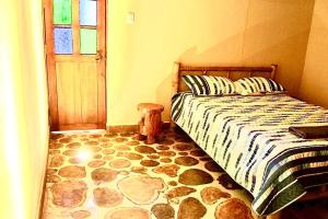 Säng eller sängar i ett rum på Finca cafetera turística