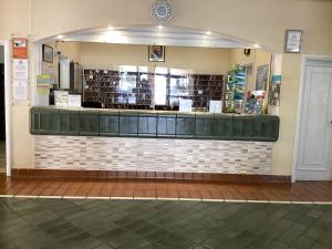 a store front with a counter in a building at Estupendo Estudio en Castle Harbour Los Cristianos in Los Cristianos +121 photos