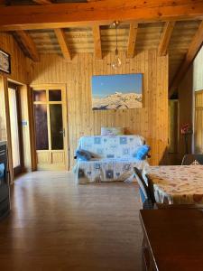 a room with two beds and a view of a mountain at casa del sole in Saint-Pierre