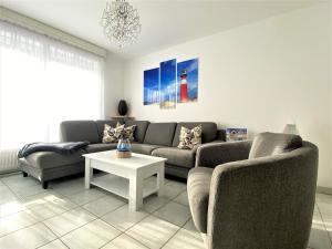 Ein Sitzbereich in der Unterkunft Haus Waldesblick An der Rennweide 26a 75 qm