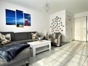 Ein Sitzbereich in der Unterkunft Haus Waldesblick An der Rennweide 26a 75 qm