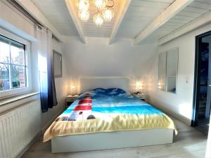 Ein Bett oder Betten in einem Zimmer der Unterkunft Haus Waldesblick An der Rennweide 26a 75 qm