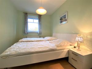 Ένα ή περισσότερα κρεβάτια σε δωμάτιο στο Haus Tante Clara Whg 18, Kukshörner Weg 8B 65qm