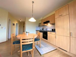 Η κουζίνα ή μικρή κουζίνα στο Haus Tante Clara Whg 18, Kukshörner Weg 8B 65qm +6 φωτογραφίες