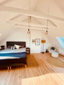 Una cama o camas en una habitación de FeelsLikeHome - Reihenhaus zwischen Hamburg und Heide mit Garten&Garage