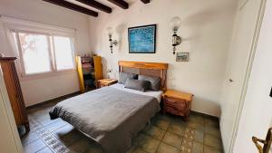 Ένα ή περισσότερα κρεβάτια σε δωμάτιο στο Villa acogedora Cambrils Playa