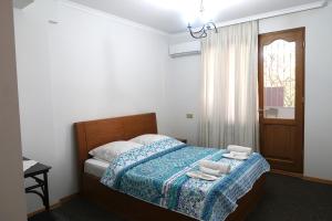 Postel nebo postele na pokoji v ubytování guest house Merci