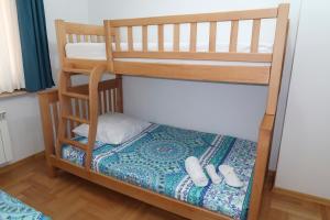 Postel nebo postele na pokoji v ubytování guest house Merci