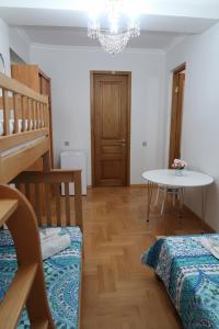 Postel nebo postele na pokoji v ubytování guest house Merci