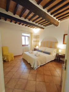 a bedroom with two beds in a room at Gest Short Rent Siena 5 in Siena
