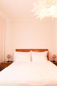 Кровать или кровати в номере A Casa Da Maria Praia do Baleal