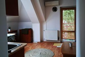 Posezení v ubytování Zöld Orom Apartman Lakás