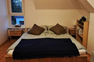 Postel nebo postele na pokoji v ubytování Zöld Orom Apartman Lakás