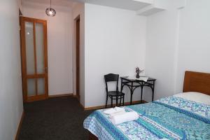 Postel nebo postele na pokoji v ubytování guest house Merci
