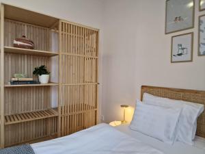 Ένα ή περισσότερα κρεβάτια σε δωμάτιο στο The Secret Garden – Keszthely