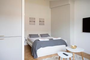 Llit o llits en una habitació de 2ndhomes Ullanlinna Penthouse Apartments 2