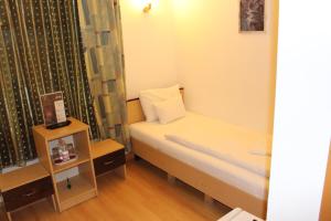 Posteľ alebo postele v izbe v ubytovaní Esprit Hotel