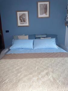 A bed or beds in a room at Casa Camilla
