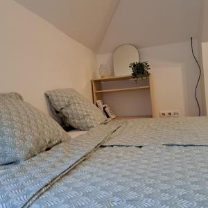 Postel nebo postele na pokoji v ubytování Zöld Orom Apartman Lakás