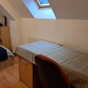 Postel nebo postele na pokoji v ubytování Zöld Orom Apartman Lakás