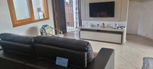 Et tv og/eller underholdning på Casa Cibratel 2 Itanhaém