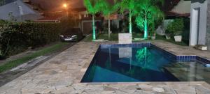 Swimmingpoolen hos eller tæt på Casa Cibratel 2 Itanhaém