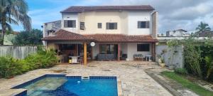 Swimmingpoolen hos eller tæt på Casa Cibratel 2 Itanhaém