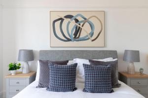 Postel nebo postele na pokoji v ubytování Lythwood House