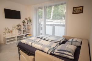 Postel nebo postele na pokoji v ubytování Apartmán víla Amálka