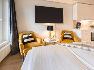 Ένα ή περισσότερα κρεβάτια σε δωμάτιο στο Premium home in Pori center with sauna and balcony