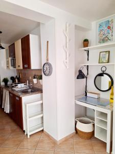 Kuchyň nebo kuchyňský kout v ubytování Apartment Megi in Supetar historical core
