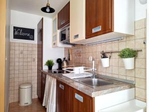Kuchyň nebo kuchyňský kout v ubytování Apartment Megi in Supetar historical core