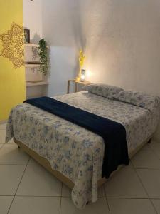 Postel nebo postele na pokoji v ubytování Suíte São Benedito