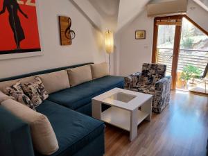 Posezení v ubytování Novak Apartment
