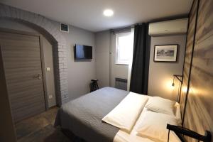 Postel nebo postele na pokoji v ubytování Rooms Kaktus