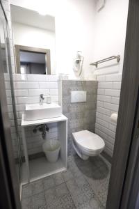 Koupelna v ubytování Rooms Kaktus