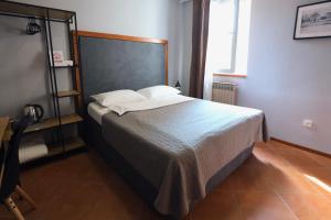 Postel nebo postele na pokoji v ubytování Rooms Kaktus