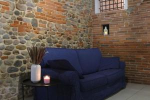 Ein Sitzbereich in der Unterkunft Borgo dei vigneti