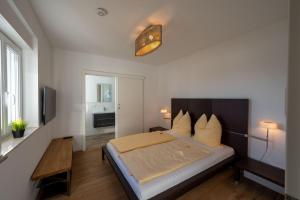 Postel nebo postele na pokoji v ubytování Bauern-Ferienhaus-im-Allgaeu