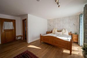 Postel nebo postele na pokoji v ubytování Bauern-Ferienhaus-im-Allgaeu