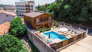an overhead view of a house with a swimming pool at Prego Lux in Ulcinj