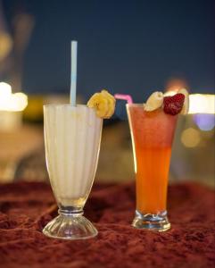 two drinks sitting on top of a table at Pyramid stars inn in Cairo